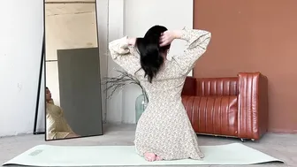 Leg stretching and yoga at home in a dress #6