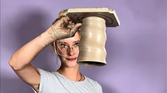 Doing Pottery in a Blue Shirt