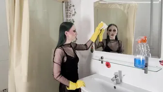 Cleaning the mirror in yellow rubber gloves #3