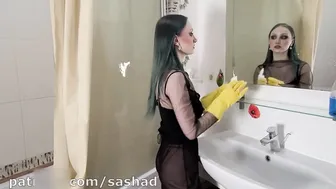 Cleaning the mirror in yellow rubber gloves #4