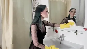 Cleaning the mirror in yellow rubber gloves #5