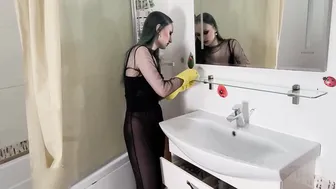 Cleaning the mirror in yellow rubber gloves #8