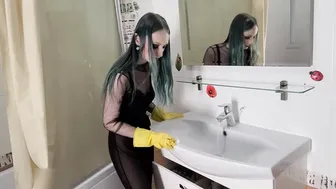 Cleaning the mirror in yellow rubber gloves #9