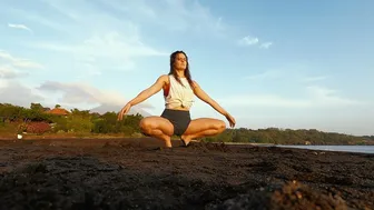 Malasana Squat with the Sunrise at the Beach in Bali - If You Wanna Fly