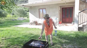 BBQ. Cooking on fire. Cooking in a mountain village. Mila naturist #5