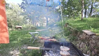 BBQ. Cooking on fire. Cooking in a mountain village. Mila naturist #7