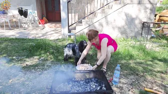 BBQ. Meat on fire. Cooking in a mountain village. Mila naturist #6