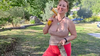 Chopping wood and lighting a barbecue. Cooking in a mountain village. BBQ. Mila naturist. #1