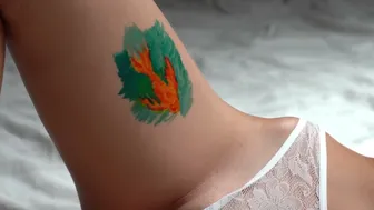 Temporary tattoo painting art near bikini