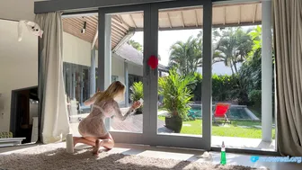 Cleaning the window in a transparent dress #3