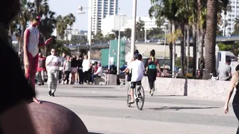 Funny Alien Girl Wows Onlookers with Superior Flexibility at Beach in Santa Monica #6