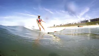 4 Surfer Girls Wearing Body Paint