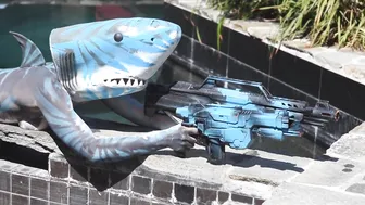 The only thing tougher than a shark is a naked lady shark with guns #3