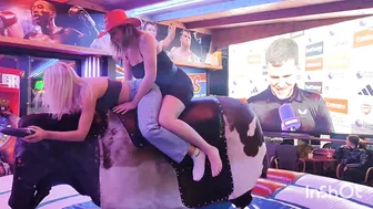 Beautiful ladies riding mechanical bull in Benidorm #4