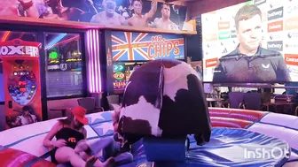 Beautiful ladies riding mechanical bull in Benidorm #8