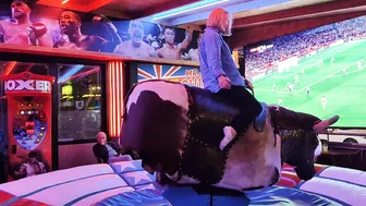 Mechanical bull riding,/ mum on the bull in Benidorm #2