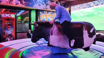 Mechanical bull riding,/ mum on the bull in Benidorm #9