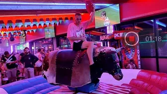 mechanical bull riding 21st of August 2923 in Benidorm Spain