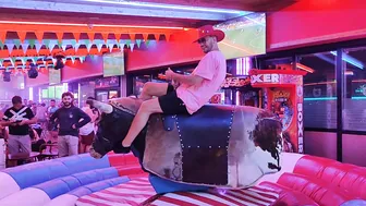 mechanical bull riding 21st of August 2923 in Benidorm Spain #4