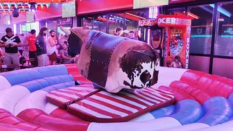 mechanical bull riding 21st of August 2923 in Benidorm Spain #5