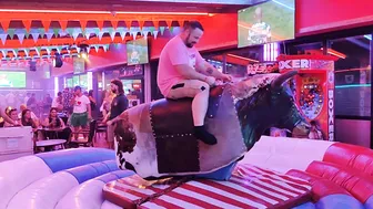 mechanical bull riding 21st of August 2923 in Benidorm Spain #8