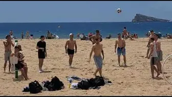 boys are playing in benidorm beach