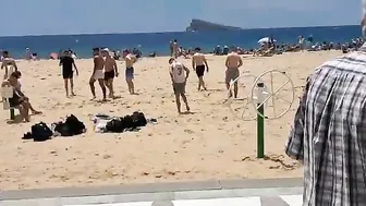 boys are playing in benidorm beach #4