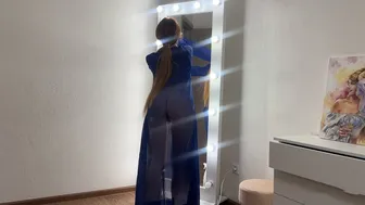 Washing the mirror in a transparent dress