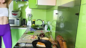 Girl cooking breakfast in leggings and white top #7