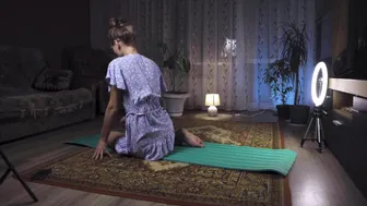 Girl doing evening yoga in short dress #7