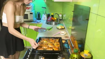 Girl cooking baked chicken in short skirt and transparent top #10