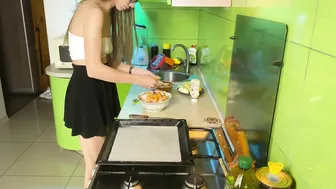 Girl cooking baked chicken in short skirt and transparent top #4