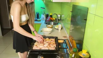 Girl cooking baked chicken in short skirt and transparent top #5