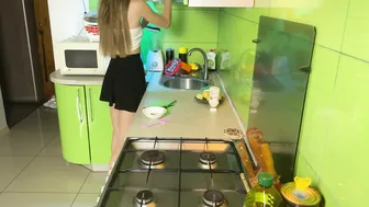 Girl cooking baked chicken in short skirt and transparent top #8