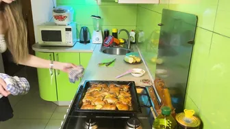 Girl cooking baked chicken in short skirt and transparent top #9