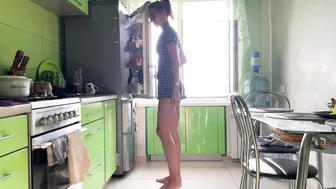 Girl cleaning kitchen in short dress #4