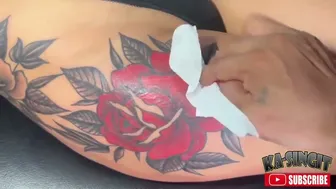 Big red rose tattoo