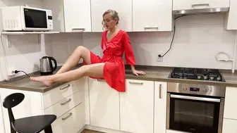 Doing leg stretches in the kitchen #3