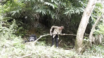 Bushcraft trip - Build a complete survival shelter - A hut under a tree with a grass roof and shrubs #2