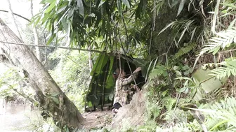 Bushcraft trip - Build a complete survival shelter - A hut under a tree with a grass roof and shrubs #5