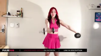 Elle in an arm training session with dumbbells #3