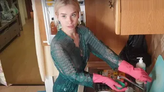 Fridge cleaning in robe and tights