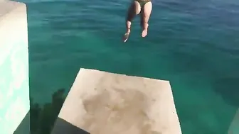 Cliff Jumping In Green Thong Bikini #8