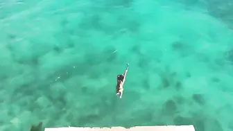 Cliff Jumping In Green Thong Bikini #9